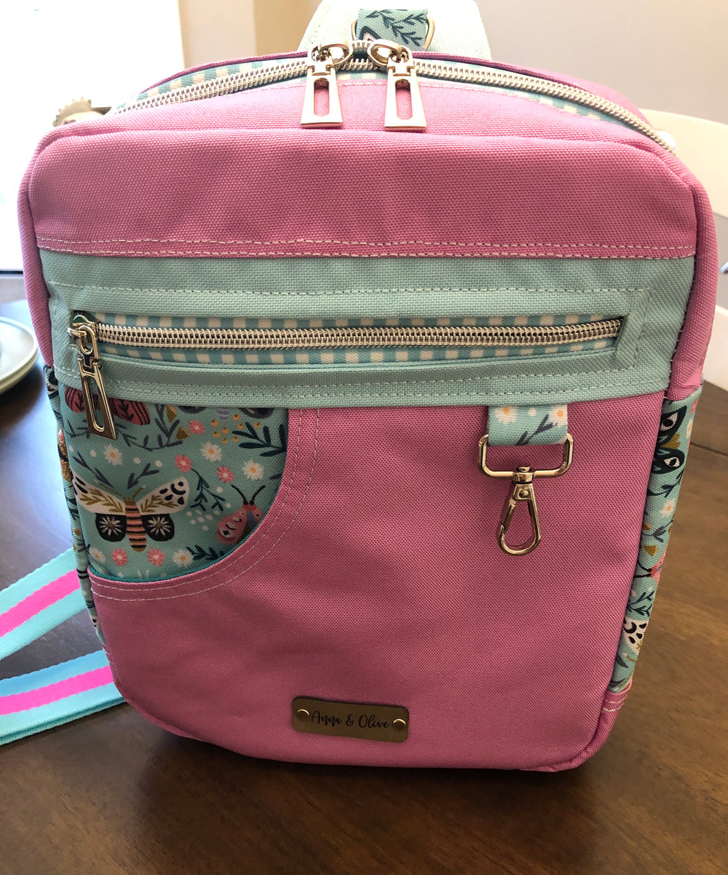 Mint Moth and pink Sling Backpack